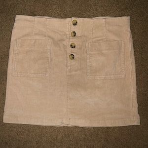 Like new! Pull on; tan corduroy, pencil mini skirt! Dress up or down!